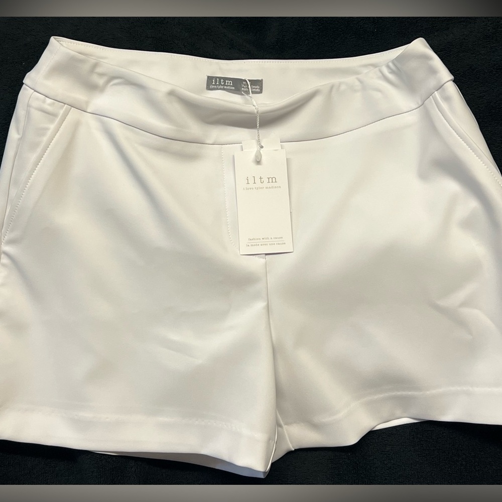 I love Tyler Madison white shorts